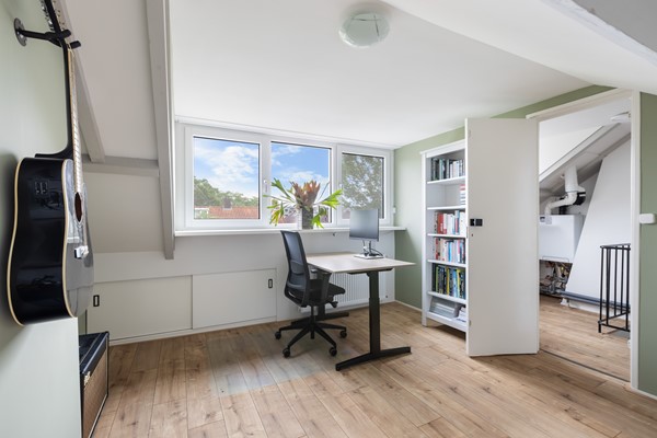 Foto - Te koop: Sfeervolle tussenwoning met groene oase!
